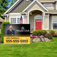 Printed coroplast yard sign on an H-stake in front of a house