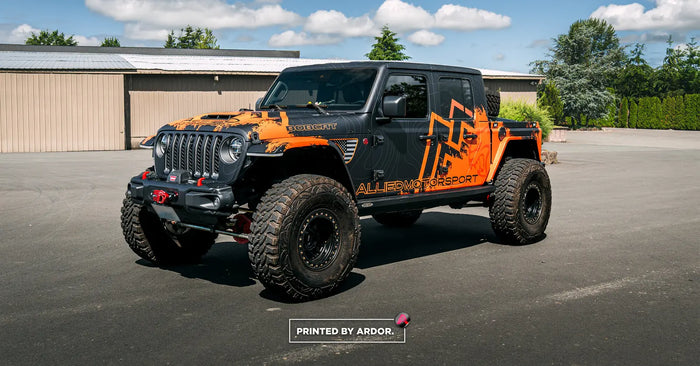 Custom printed Jeep Wrangler wrap with orange mountain graphics