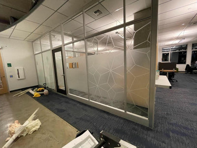 Decorative frosted window film with geometric pattern on office glass walls and doors, view 2 by Ardor Printing