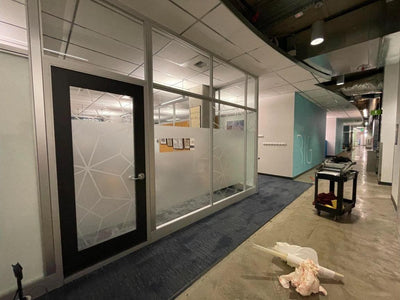 Decorative frosted window film with geometric pattern on office glass walls and doors, view 3 by Ardor Printing