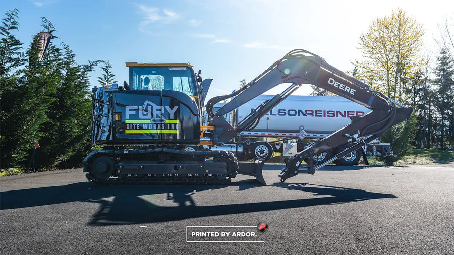 Excavator wrap with American flag graphics for Fury Site Works