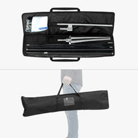 Black carry bag for small and medium feather flags, open with the pole set inside and closed