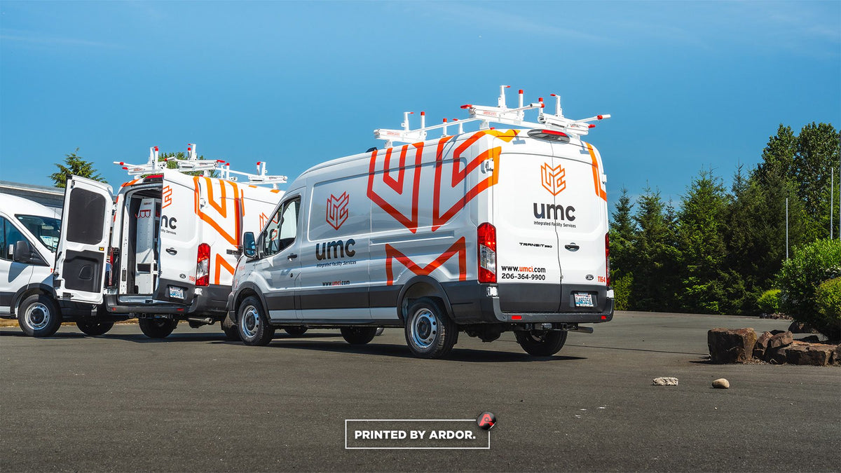 Upfitted work vans with ladder racks outside Ardor Printing in Snohomish, Washington