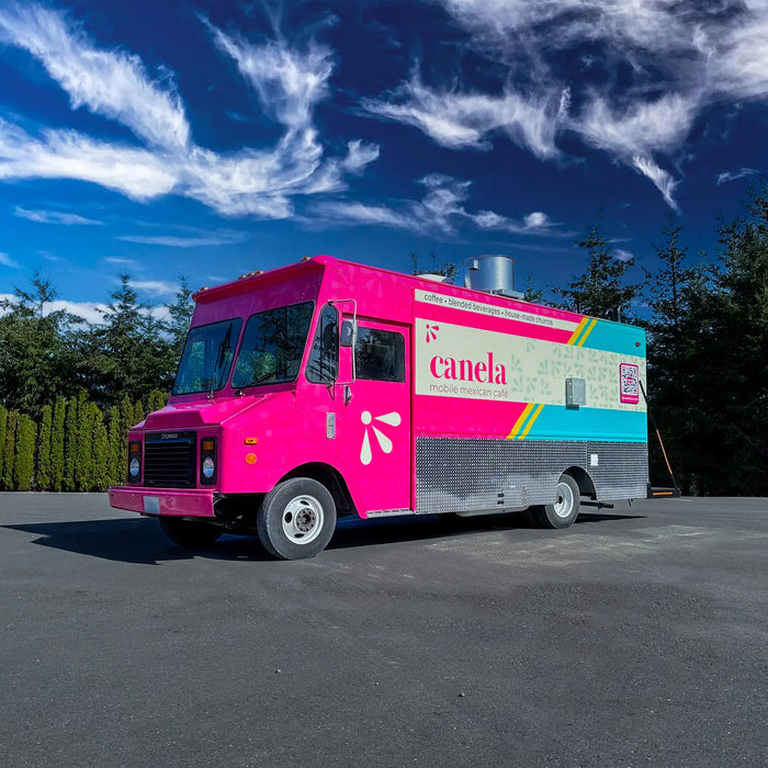 Bright pink food truck wrap for Canela