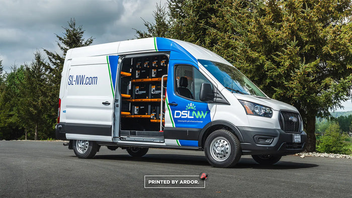 Ford Transit work van upfit with shelving and graphics for DSLNW