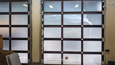 Frosted privacy window film installed on a glass garage door, view 4 by Ardor Printing