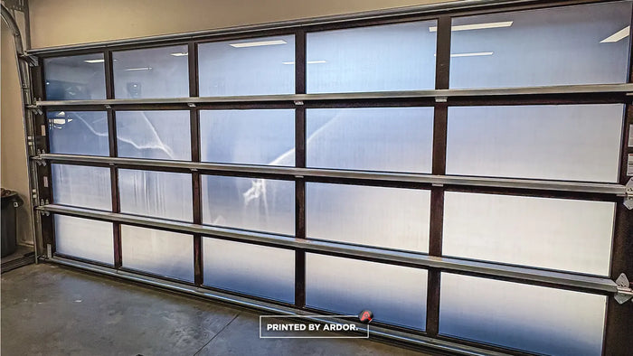 Frosted privacy film installed on glass garage doors