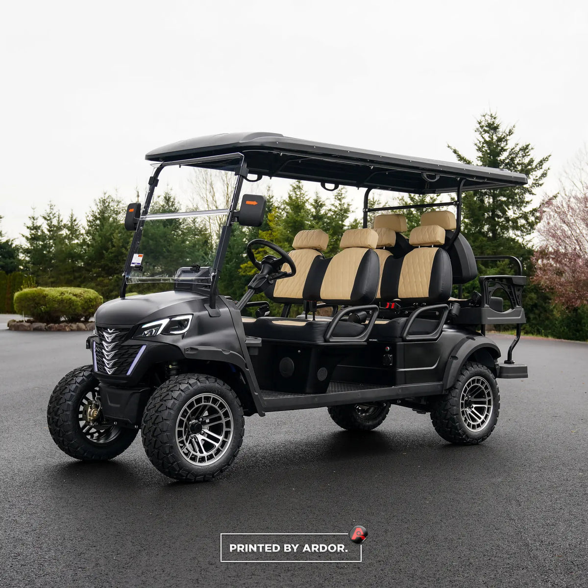 Custom black wrap on a lifted golf cart by Ardor Printing