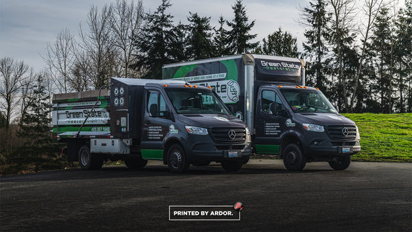 Green State Restoration work trucks with matching dark green fleet wraps by Ardor Printing