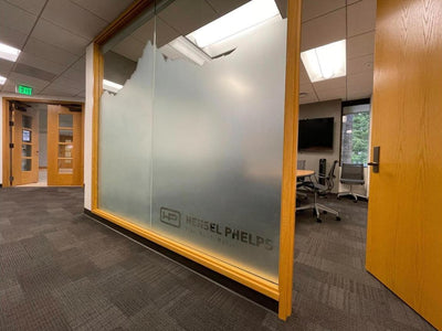 Custom-cut frosted window film with mountain skyline design on Hensel Phelps office conference room glass, view 3 by Ardor Printing