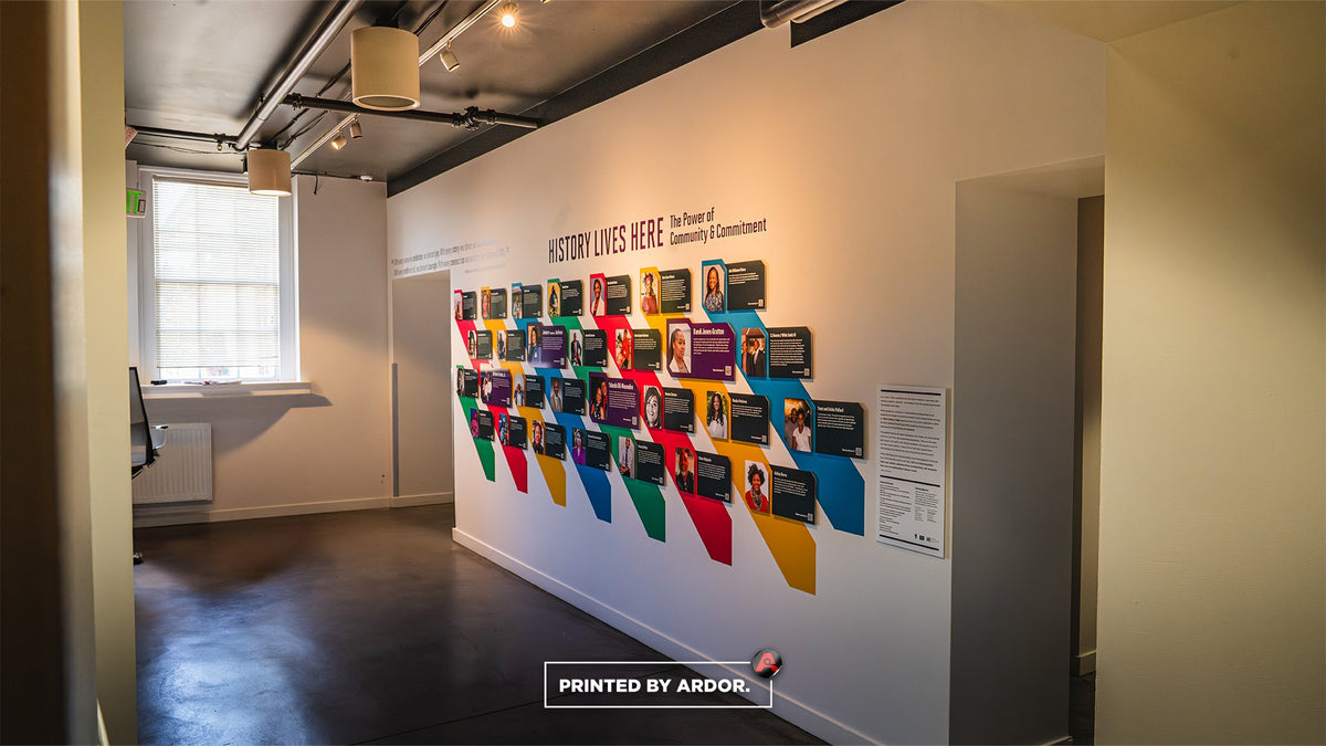 History Lives Here wall graphics with colorful panels in a hallway, printed and installed by Ardor Printing