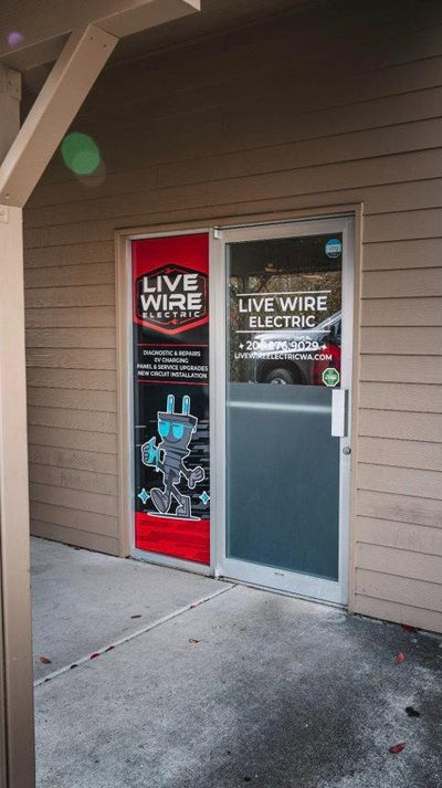 Live Wire Electric storefront door graphics with frosted privacy band, view 3 by Ardor Printing