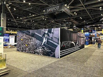 Marport island trade show booth with printed wall graphics and hanging sign by Ardor Printing, view 10