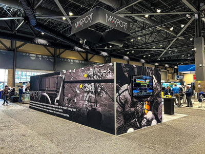 Marport island trade show booth with printed wall graphics and hanging sign by Ardor Printing, view 12
