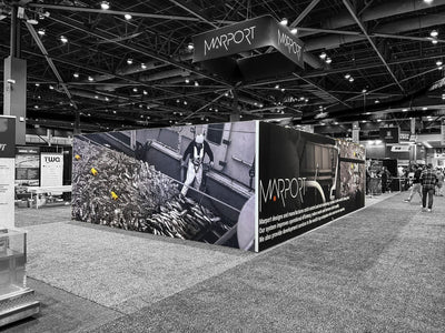 Marport island trade show booth with printed wall graphics and hanging sign by Ardor Printing, view 2