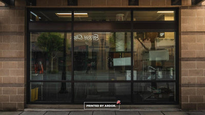 Nom House storefront windows before window graphics by Ardor Printing