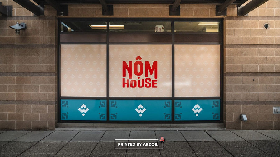 Nom House restaurant storefront window graphics installed by Ardor Printing