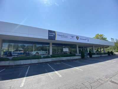 Building banners for an Open Road luxury car dealership by Ardor Printing, view 2