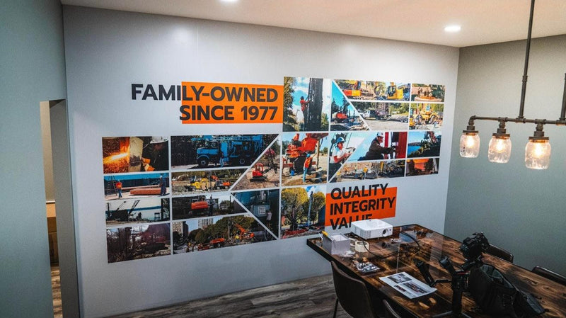 Pearson Drilling office wall wrap with a photo collage of company history by Ardor Printing, view 2