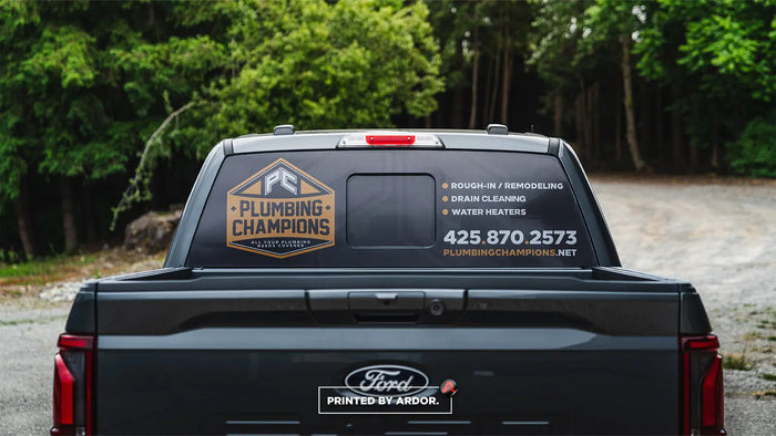 Perforated rear window graphic on a pickup for Plumbing Champions