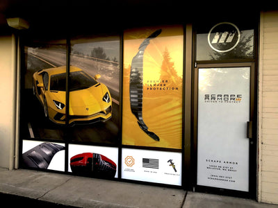 Scrape Armor Bellevue storefront with full-coverage perforated window graphics, view 2 by Ardor Printing