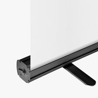 Black 33 x 81 inch retractable banner stand base shown with a blank banner pulled up