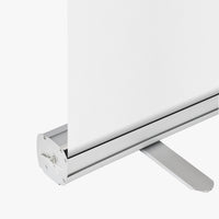 Standard retractable banner stand base shown with a blank banner pulled up