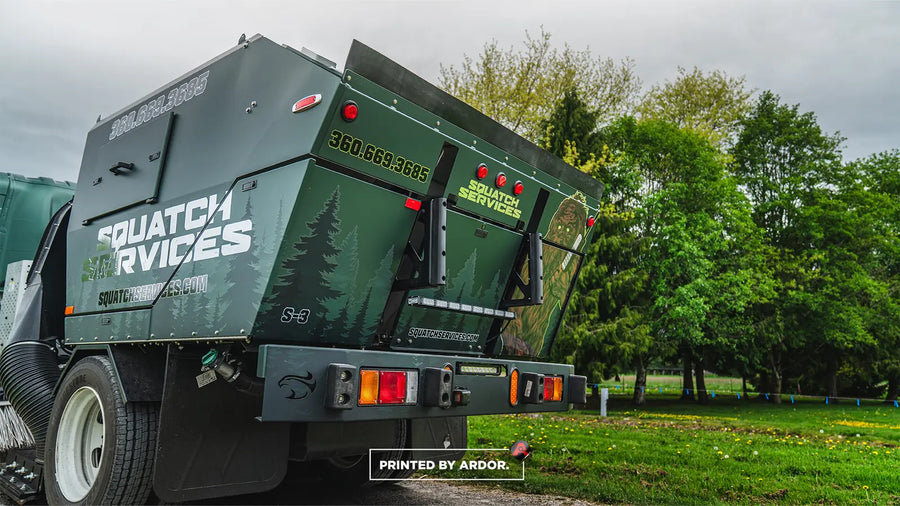 Street sweeper truck wrap for Squatch Services