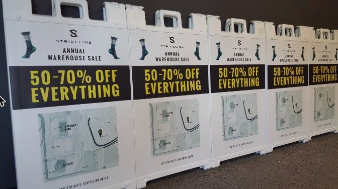Strideline warehouse sale A-frame signs in Seattle