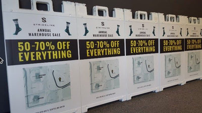 Strideline warehouse sale A-frame signs in Seattle by Ardor Printing