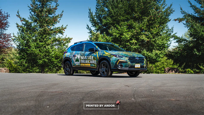 Subaru company car wrap for Seattle Tree Care