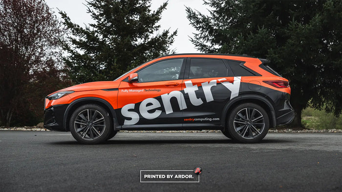Orange and black commercial SUV wrap for Sentry