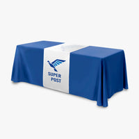 Printed table runner over a solid color table throw