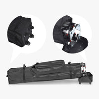 Tent carrying bag with wheels showing the casters, handles and compartments