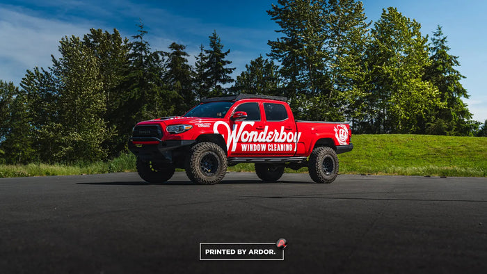 Red pickup truck wrap for Wonderboy Window Cleaning