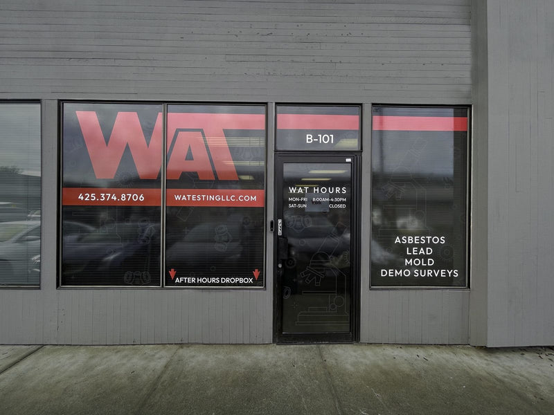 WAT storefront window graphics with hours and services by Ardor Printing