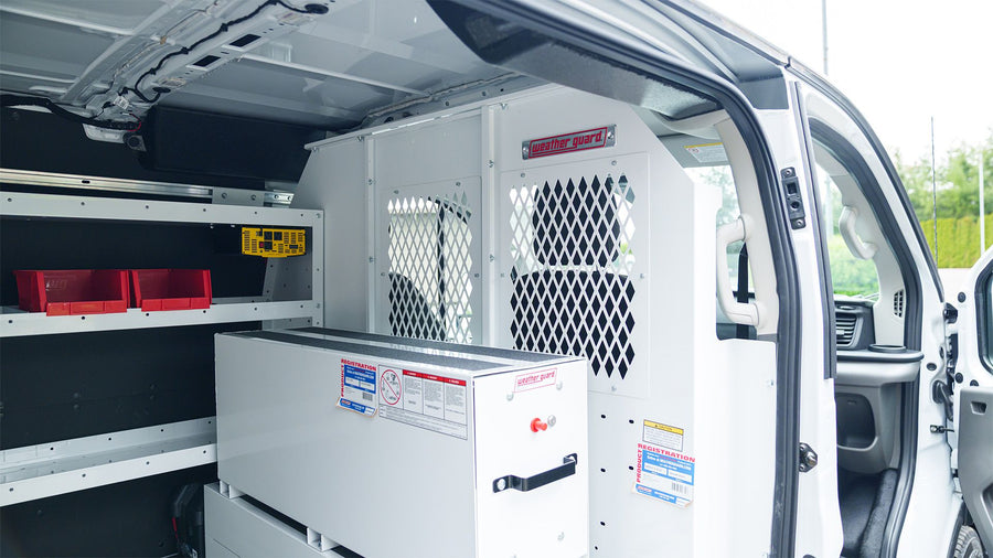 WEATHER GUARD bulkhead and locking drawer unit in a work van