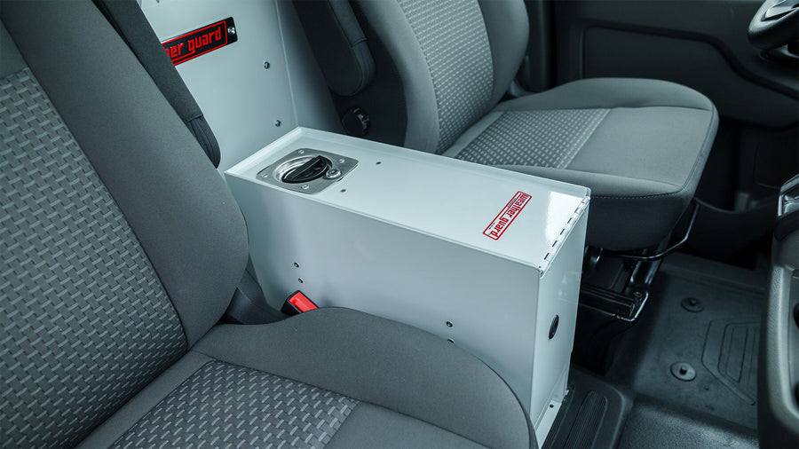 WEATHER GUARD locking console vault in a work van cab