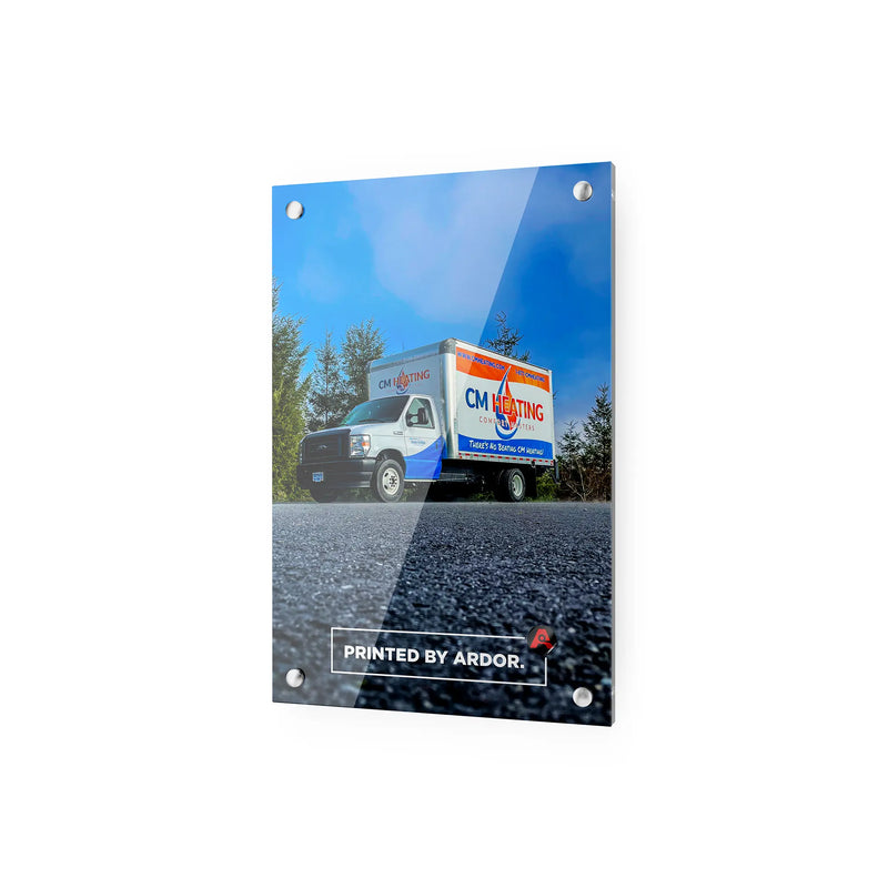 Acrylic glass print on corner standoffs showing a CM Heating box truck