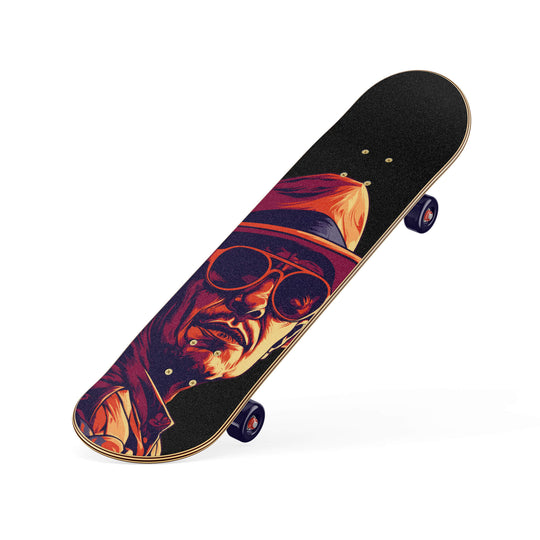 Skateboard shown at an angle with a high-quality grip tape featuring a graphic of a renowned author in vibrant red and orange colors.