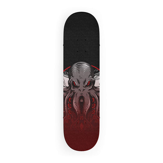 Top-down view of skateboard grip tape featuring majestic octopus in faded colors on a dark grey background.