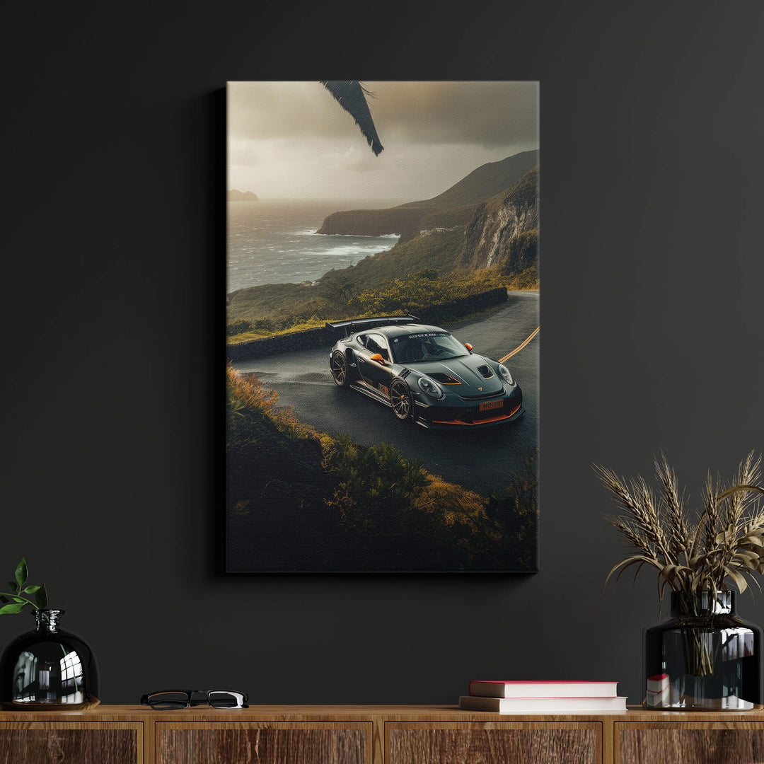 Dark and vibrant canvas print of a Porsche 911 GT3 on 1.5” stretcher bars, mounted on black wall above wood desk in living room.