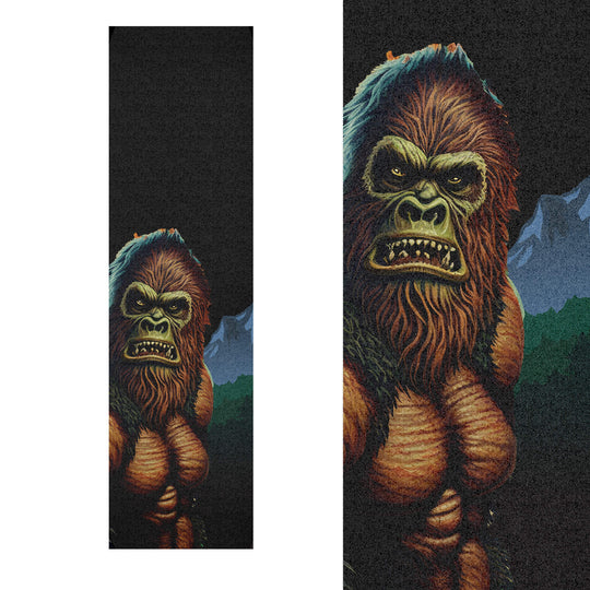 Detailed view of uncut Skateboard Grip tape, featuring fury brown artwork of Sasquatch surrounded by mountains and trees.